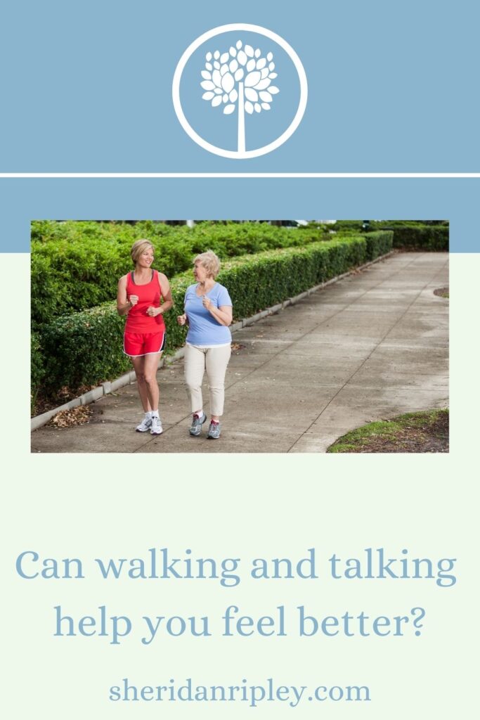 women walking while talking to feel better emotionally